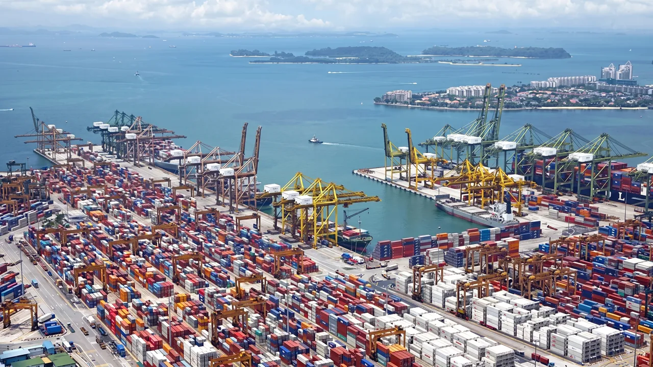 Container port with cranes and shipping containers